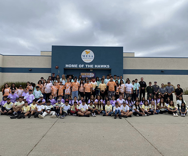 Group photo of Sheriff's Youth Summer Camp participants and Sheriff's Office staff.